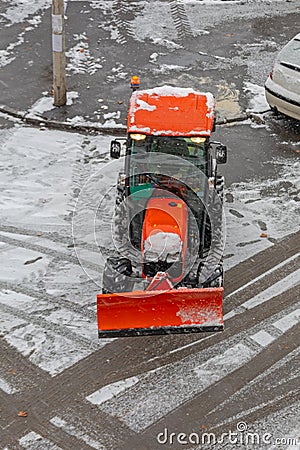 Snow Plow Tractor Stock Photo