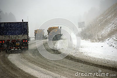 Snow plows keep the road open Stock Photo