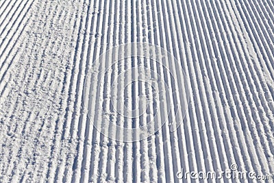 Snow on the prepared ski slopes sunny winter day Stock Photo