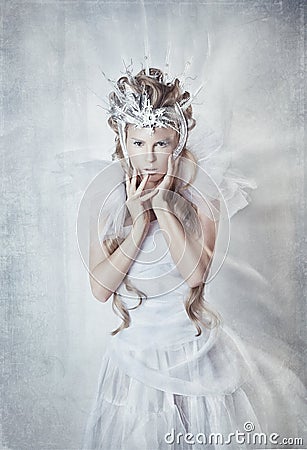 The snow Queen in a white dress Stock Photo