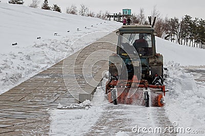 Snow removal after a snowfall the memorial complex Mamaev Kurgan with a special tractor Editorial Stock Photo