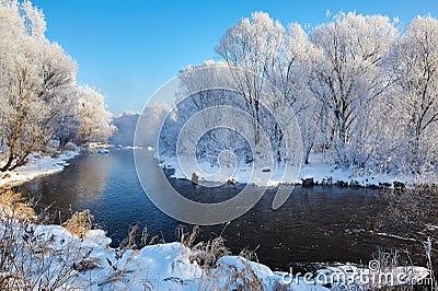 The snow and river and rime of forest Stock Photo