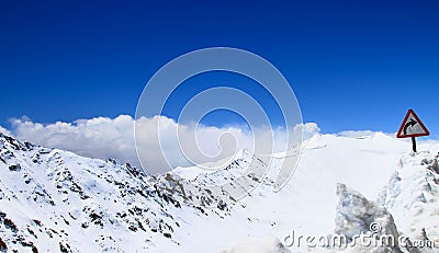 Snow and road sign Stock Photo