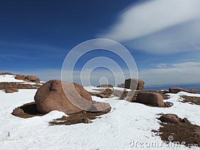 Snow and rocks with blue sky Stock Photo