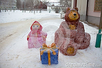 Snow sculpture cartoon characters Masha and the Bear. Russia Editorial Stock Photo