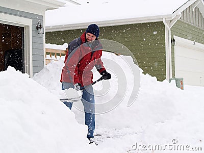 Snow shoveling Stock Photo