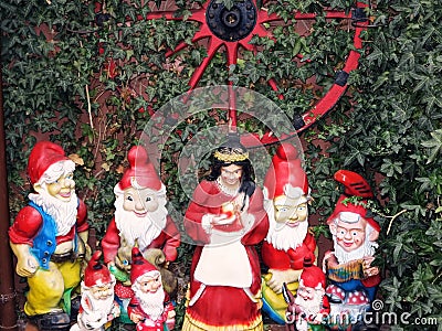 Snow White and the Seven Dwarfs in a garden of the fairy tale town Steinau a.d.StraÃŸe, Germany Stock Photo