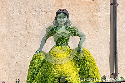 Snow White topiary display figure on display at Disney World Editorial Stock Photo
