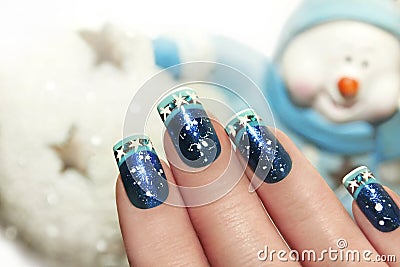 Snow winter manicure. Stock Photo