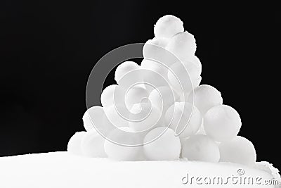 Snowballs heap on black background Stock Photo