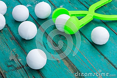 Snowballs made with the help of a snowdrop Stock Photo