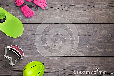 Snowboard equipment on a wooden table. Copy space, flat lay, top view composition Stock Photo