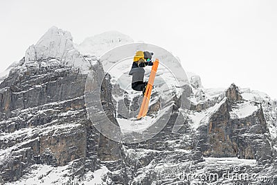 Snowboard ski freestyle big air contest in the background Mittelhorn mountain. Snowboard tricks, ski tricks. Jungfrau region Editorial Stock Photo