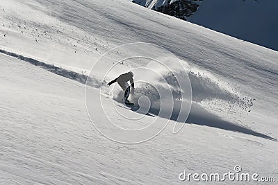 Snowboarder in deep powder snow Stock Photo