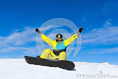 Snowboarder excited happy raised arms hands up Stock Photo