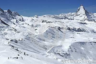 Snowboarder in front of Matterhorn Stock Photo
