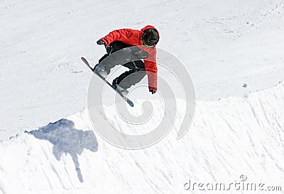 Snowboarder on half pipe of Pradollano ski resort in Spain Stock Photo