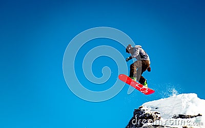 Snowboarder jump Stock Photo