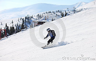 Snowboarder on a mountain slope Stock Photo