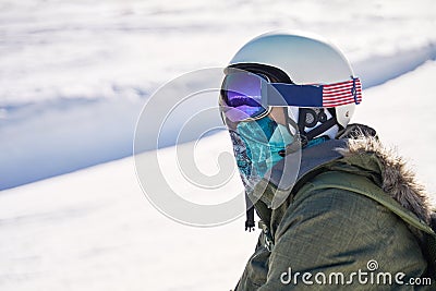 Snowboarder Reflecting on the Slopes Stock Photo