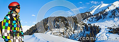 Snowboarder in the snowy mountains. Stock Photo