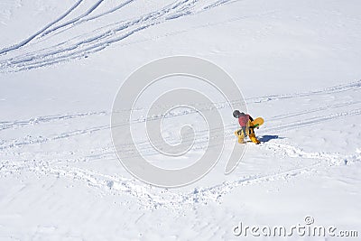 Snowboarder stopped due to plains and deep snow Stock Photo