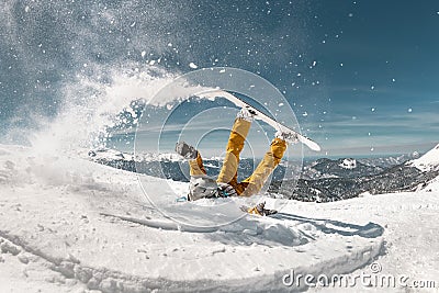 Real snowboarders fall at offpiste ski slope Stock Photo