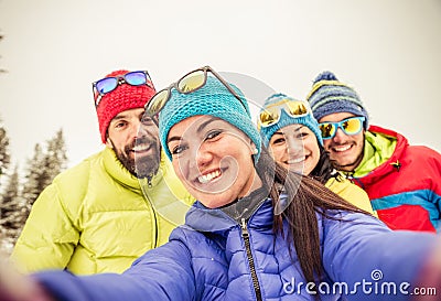 Snowboarders taking selfie Stock Photo