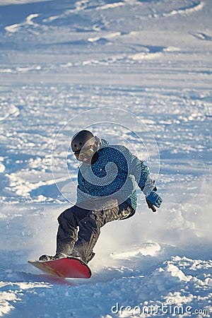 Snowboarding in fresh powder snow Editorial Stock Photo
