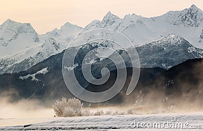 Snowcovered Mountains in Alaska. Stock Photo