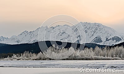 Snowcovered Mountains in Alaska. Stock Photo