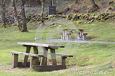 Wooden bench in the mountain of Snowdonia Stock Photo