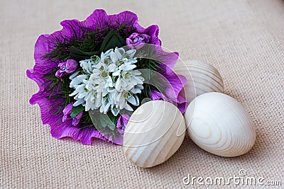 Snowdrop flowers and wooden eggs. Greeting card Stock Photo