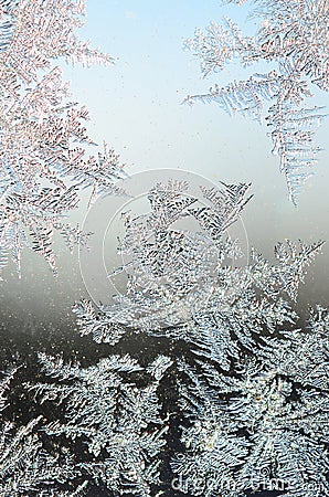 Snowflakes frost rime macro on window glass pane Stock Photo
