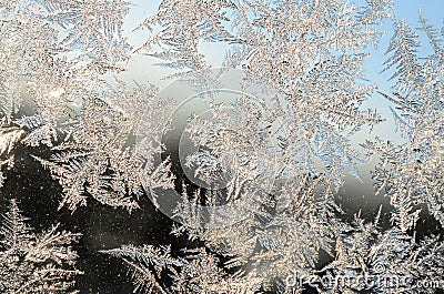 Snowflakes frost rime macro on window glass pane Stock Photo