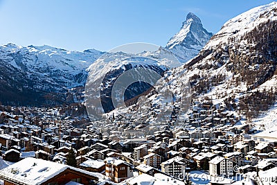 Snowing in Zermatt traditional Swiss ski resort under Matterhorn Stock Photo