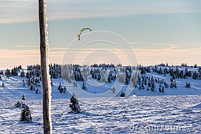 Snowkiter on snowy field Stock Photo