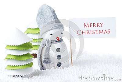 Snowman with Merry Christmas sign Stock Photo