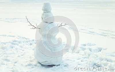 Snowman in the park Stock Photo