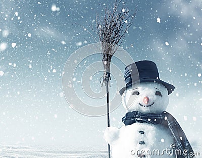 Snowman standing in christmas landscape Stock Photo