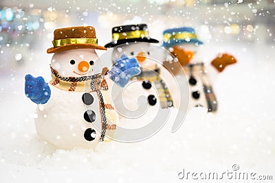 Snowman is standing in snowfall, Merry Christmas and happy New Year concept Stock Photo