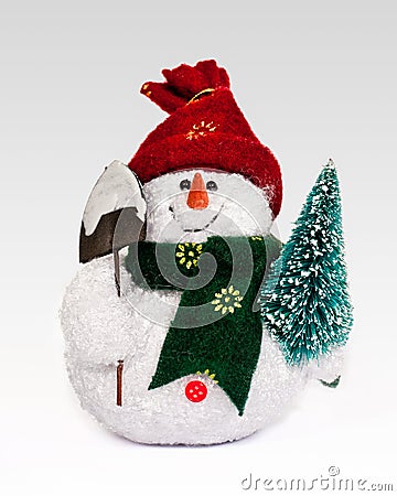 Snowman toy figure with christmas tree Stock Photo