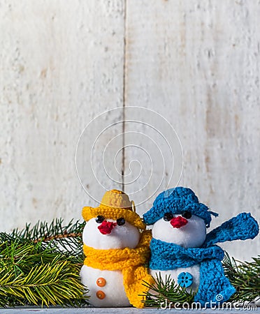 Snowmen board wooden Christmas winter plush duo Stock Photo