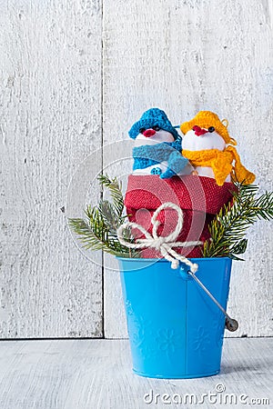 Snowmen board wooden Christmas winter plush duo Stock Photo