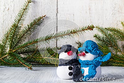 Snowmen board wooden Christmas winter plush duo Stock Photo
