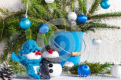 Snowmen board wooden Christmas winter plush duo Stock Photo