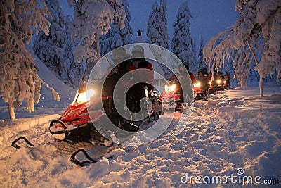 Snowmobiles in Lapland Editorial Stock Photo