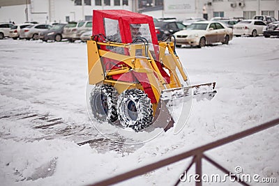 Snowplow clearing road Stock Photo