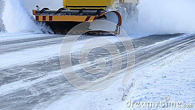 Snowplow Removes Snow Off Road Stock Photo