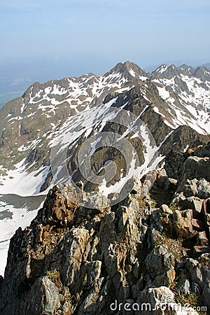 Snowy Alpine mountain range Stock Photo